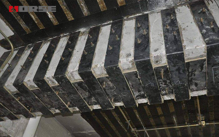 Beam and slab strengthening by steel plate