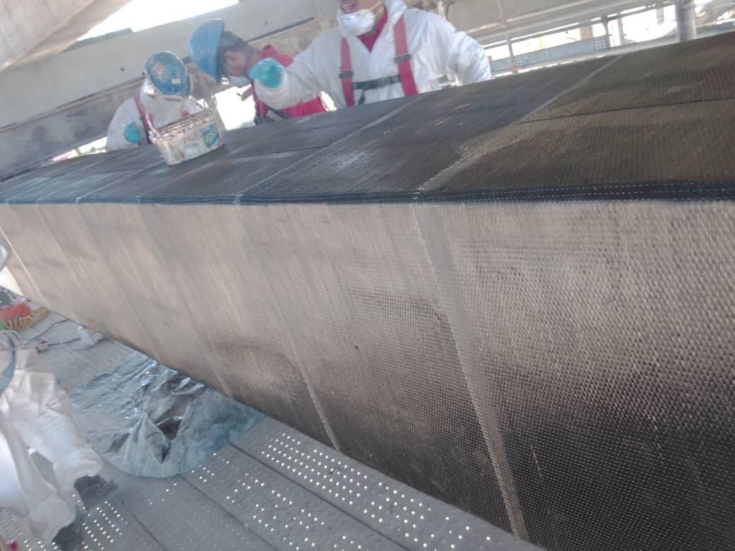 Rehabilitation of Damaged Reinforced Concrete Beams With HM-30 Unidirectional Carbon Fiber Fabric