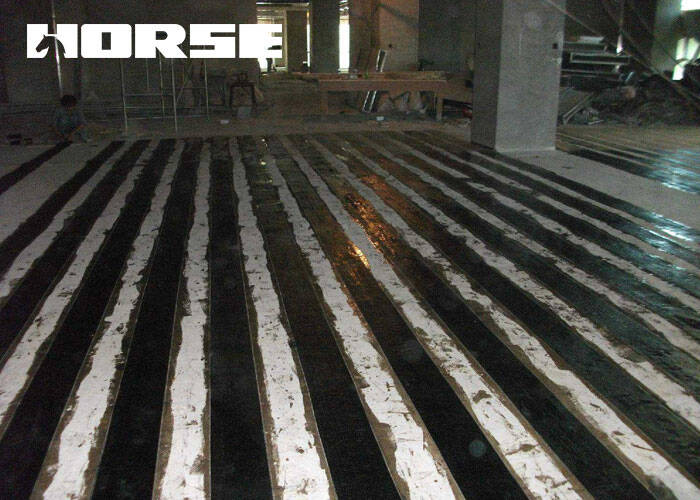 Concrete slab reinforcement by carbon fiber sheet