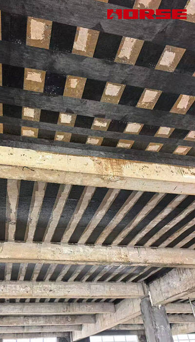 Carbon Fiber Strengthening Fire-Damaged Structural Members Carbon Fiber Strengthening Fire-Damaged Structural Members