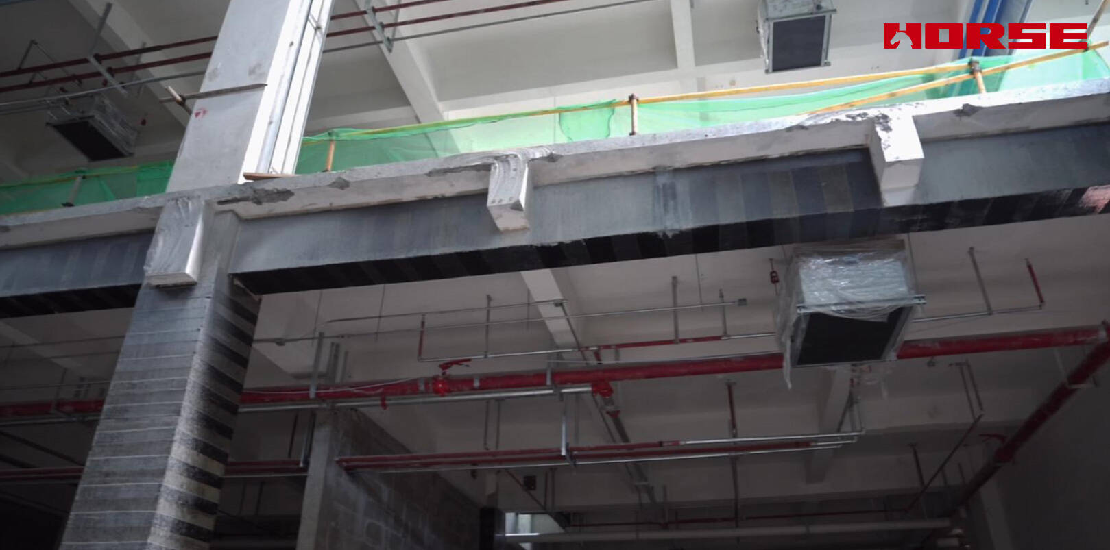 Structural Retrofit with Carbon Fiber after Floor Slab Demolition