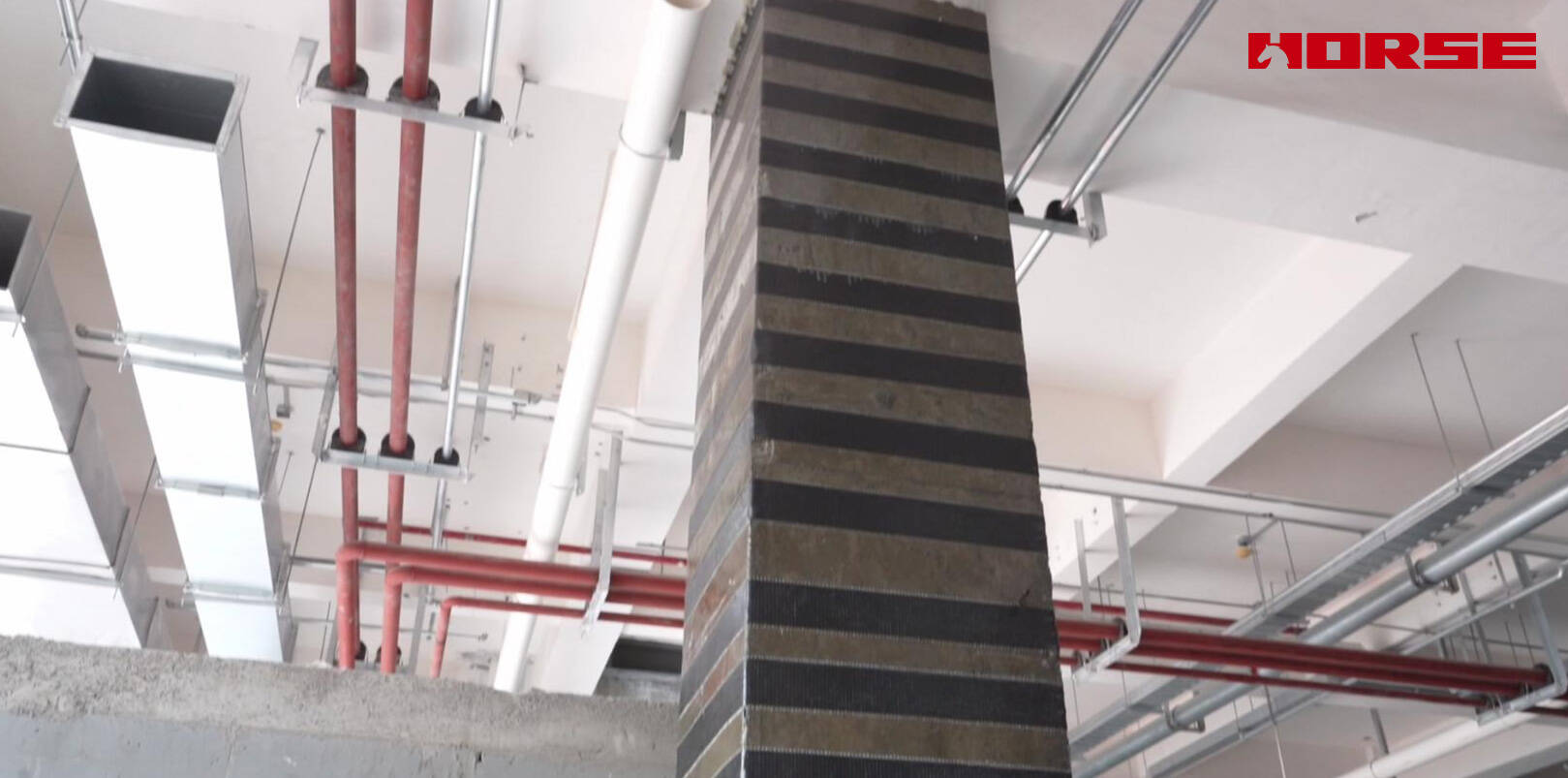 Structural Retrofit with Carbon Fiber after Floor Slab Demolition